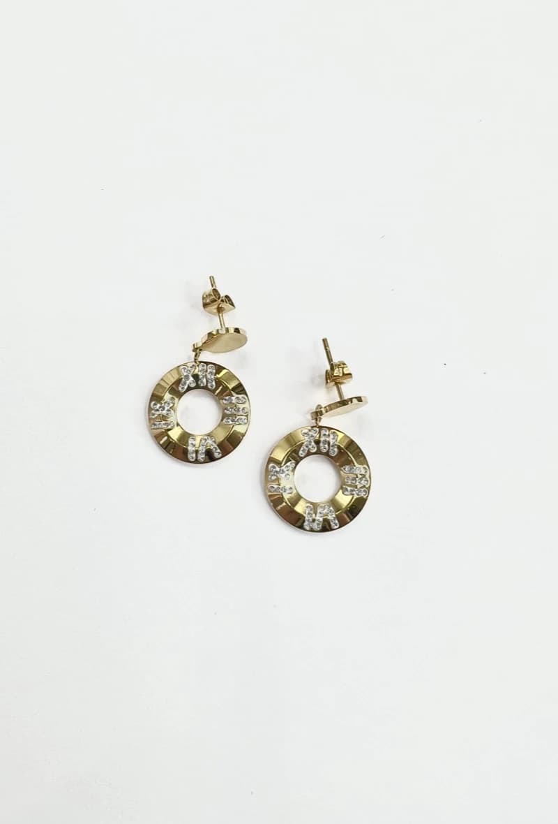 Boucle d'oreille rond horloge