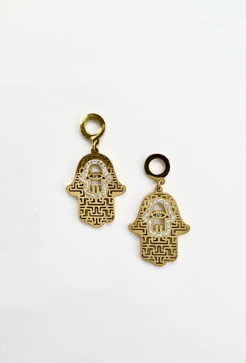 Boucle d'oreille main oriental oeil