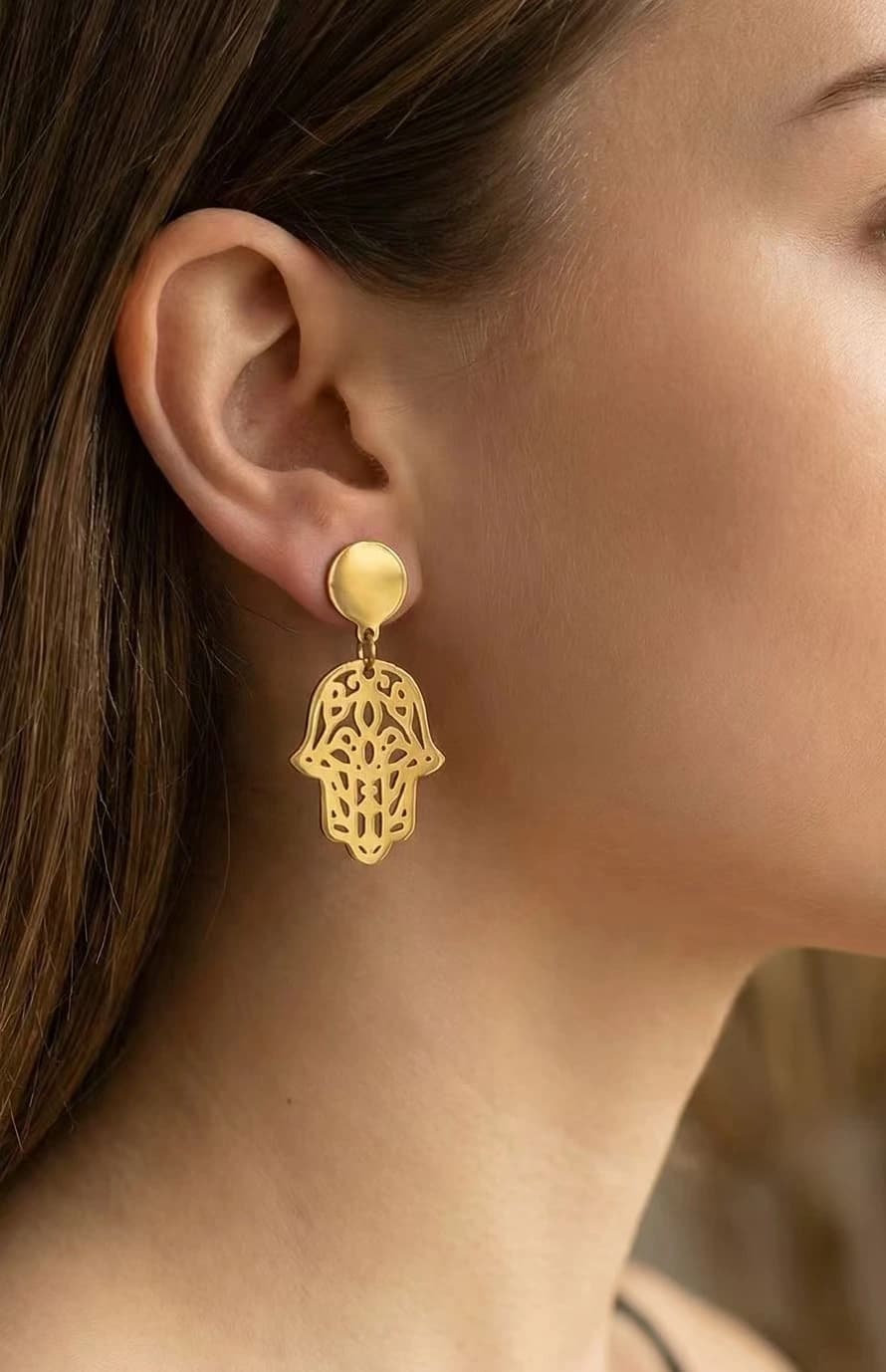 Boucle d'oreille main