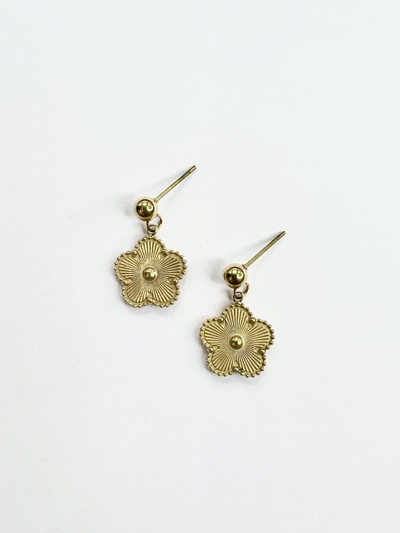 Boucle d'oreille fleur rond centre