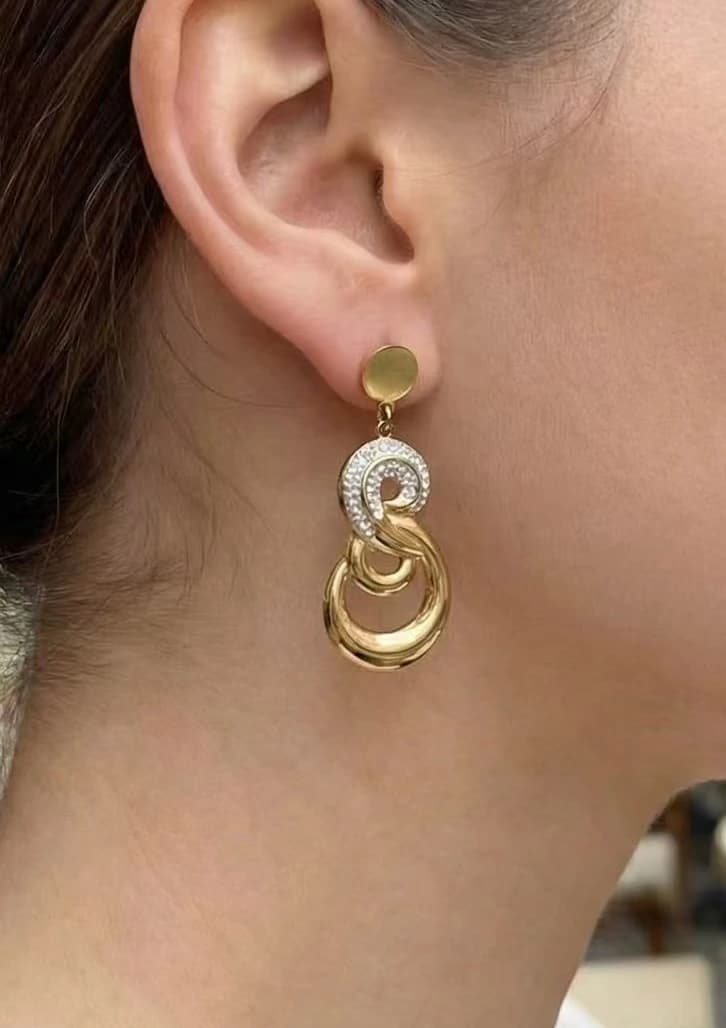 Boucle d'oreille motif infini