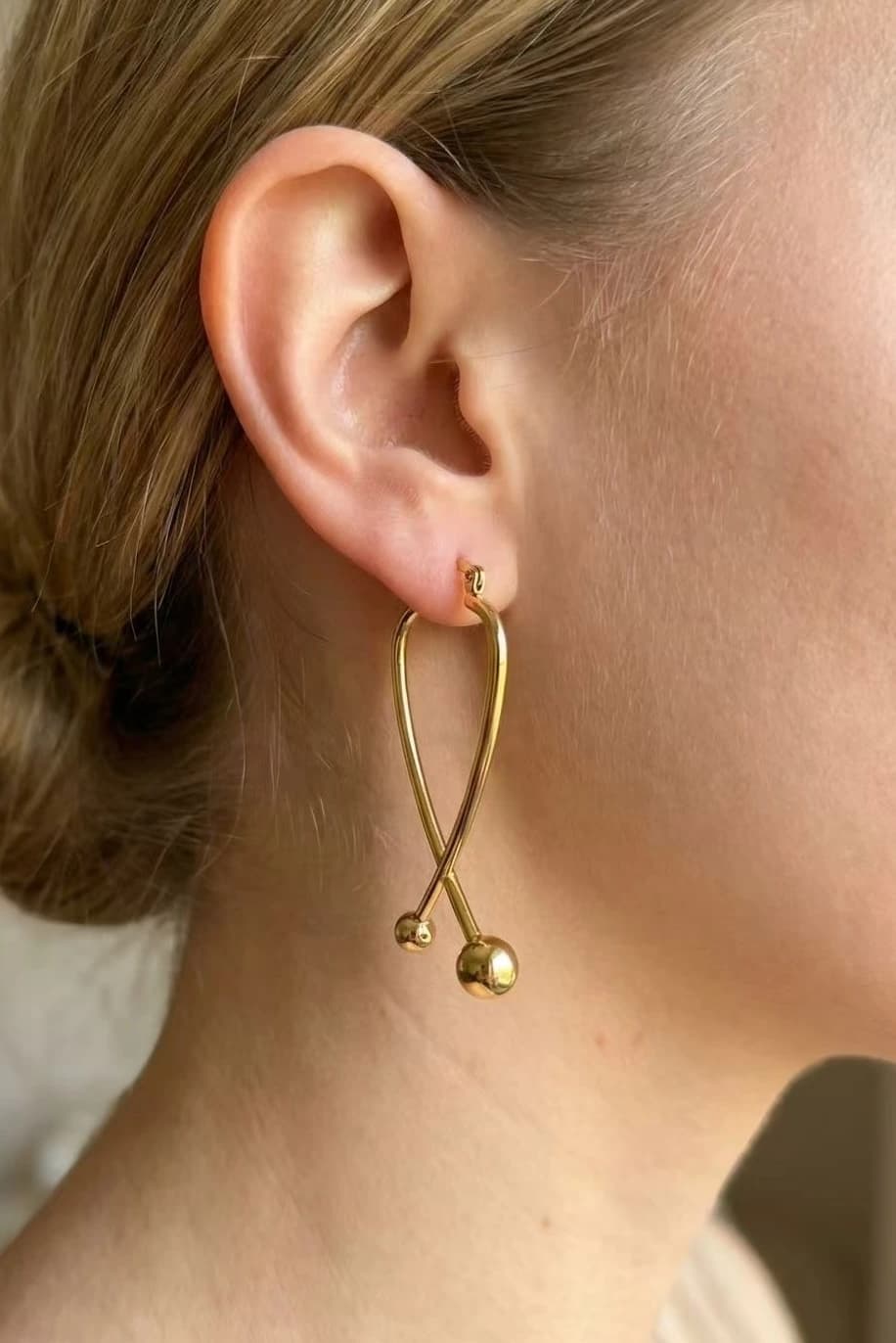 Boucle d'oreille croisé
