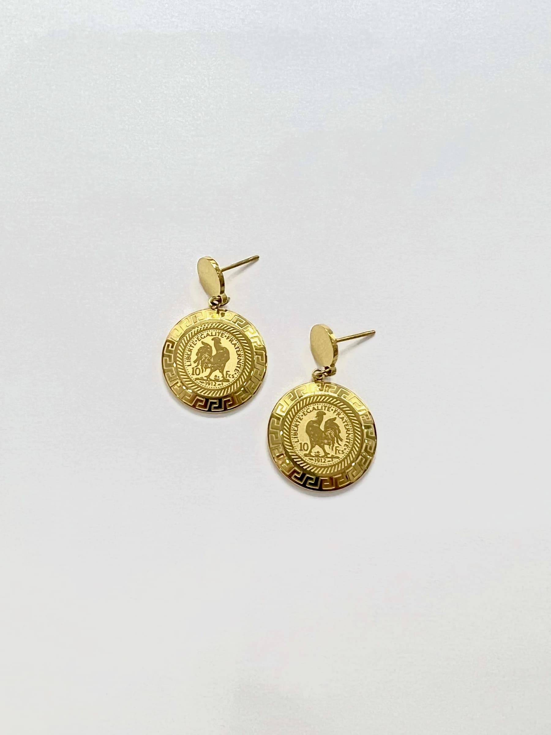 Boucle d'oreille coq rond