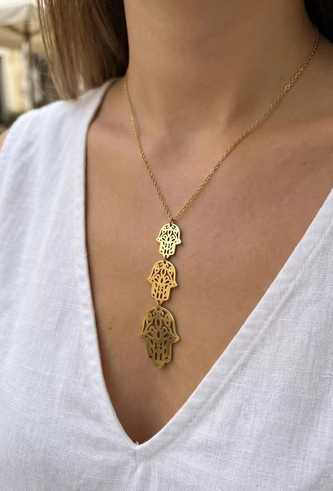 Collier main