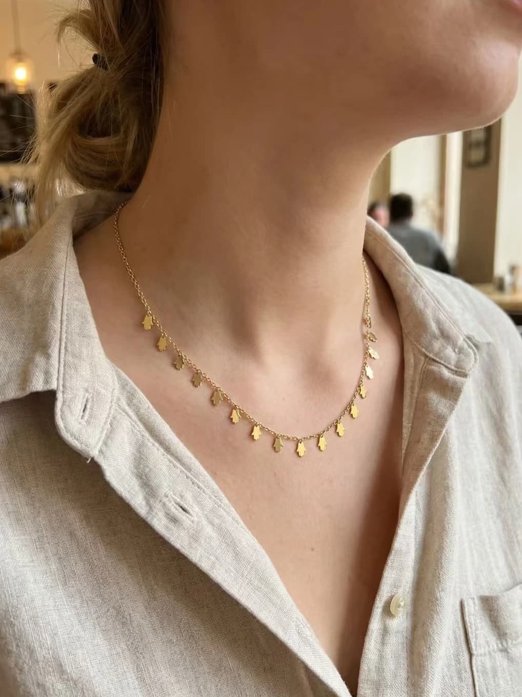 Collier main