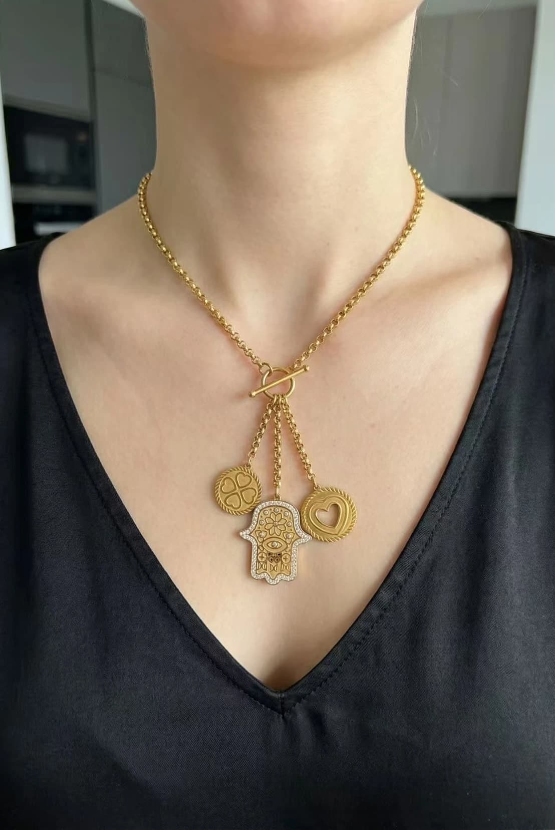 Collier main coeur trèfle