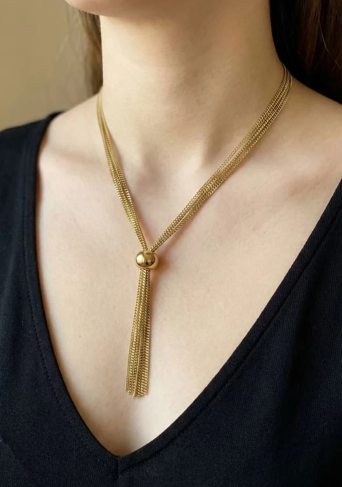 Collier boule frange