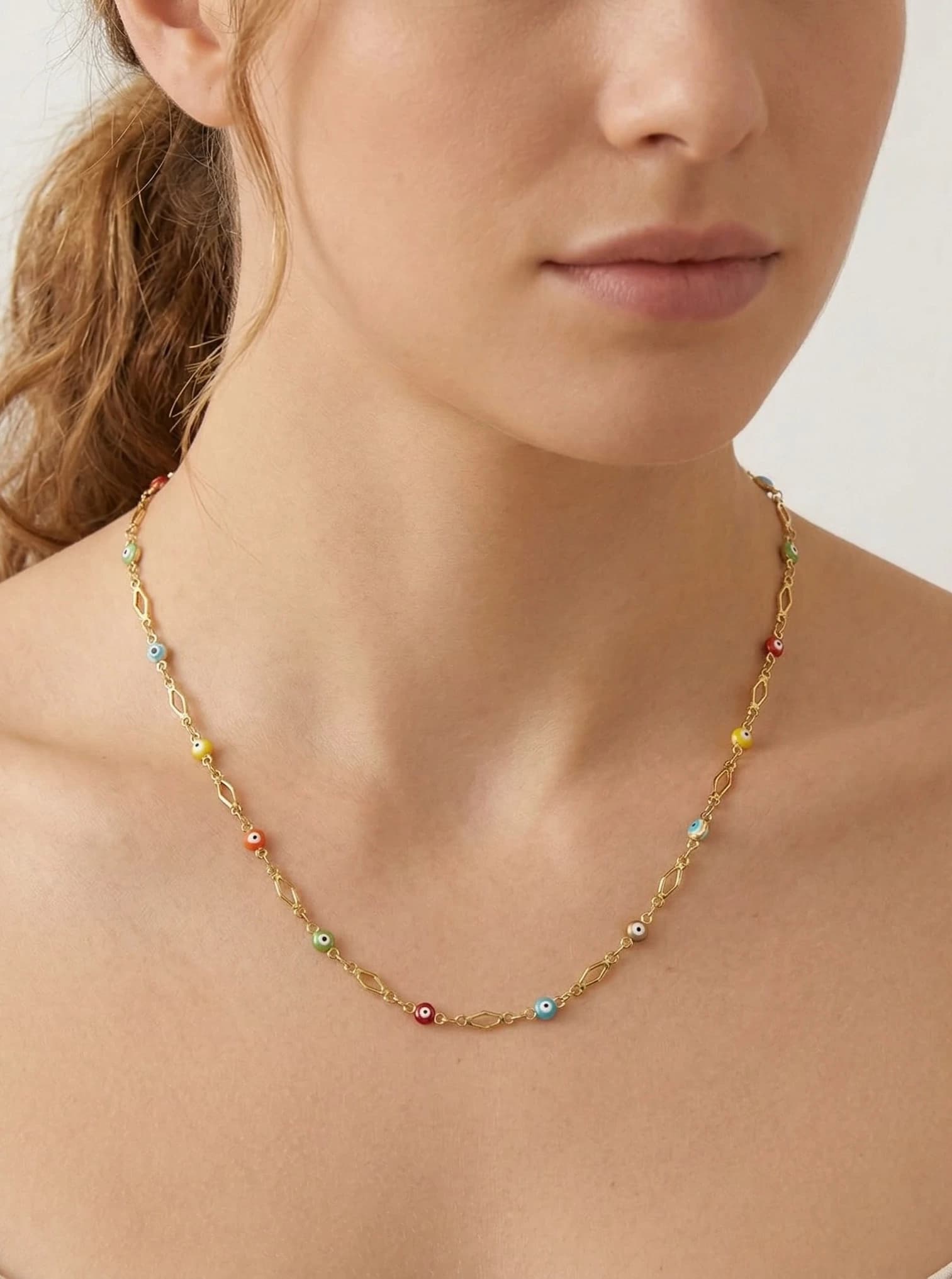 Collier triangle oeil coloré