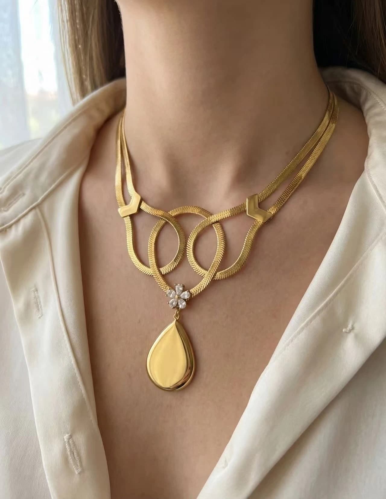 Collier spirale fleur