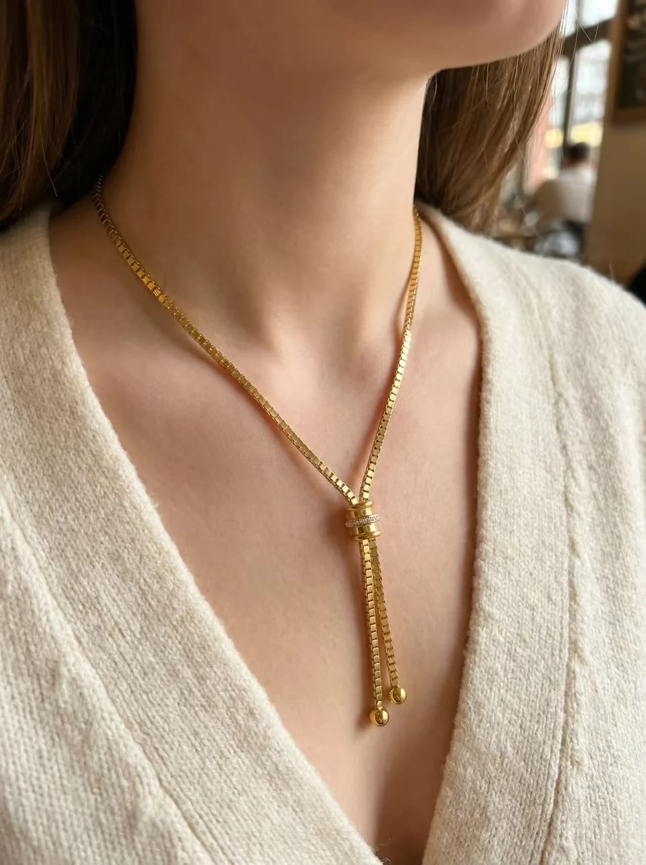 Collier pompom